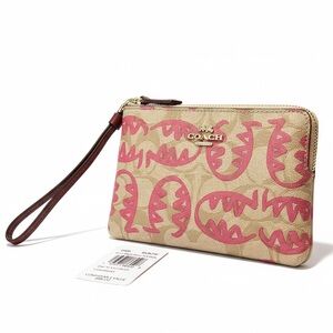 Coach Corner Zip Wristlet in Signature Canvas with Rexy by Guang Yu. NWT